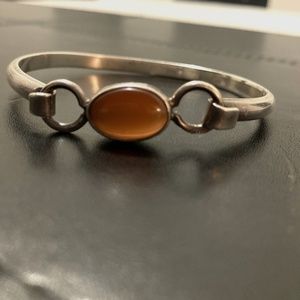 Silver bracelet with cat eye stone